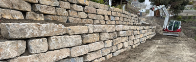 Muro de escollera con piedra natural de tacos en Málaga - MURES