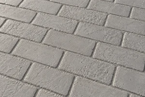 Hormigón impreso con molde Adoquín Ladrillo en color Rojo