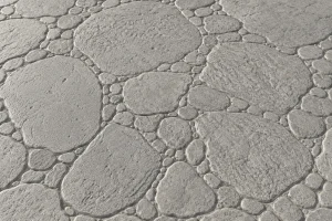 Hormigón impreso con molde Piedra de Río en color Oro