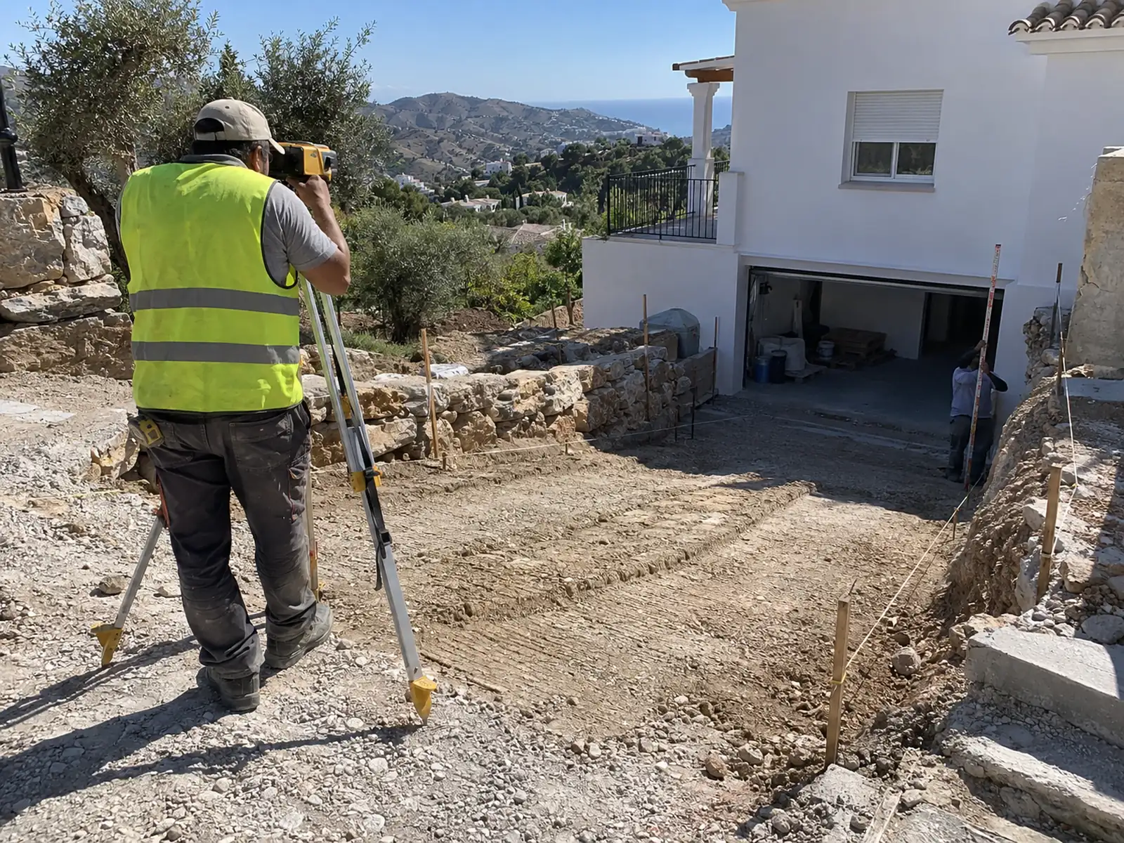 Rampas de hormigón y entradas de coches 3 Medición del desnivel de una rampa de garaje con nivel láser